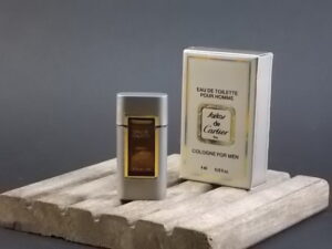 Santos, miniature Eau de Toilette Homme 4 ml avec sa boite. Lancé en 1981. De la maison Cartier