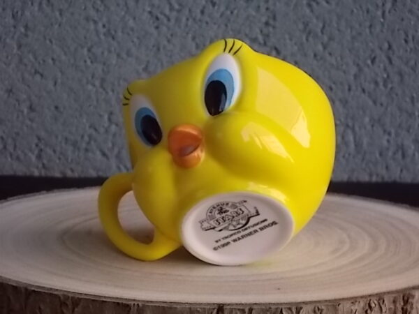 Tasse, en céramique Jaune, représentant le personnage de "Titi", de Warner Bros. Distribué par Tropico Diffusion